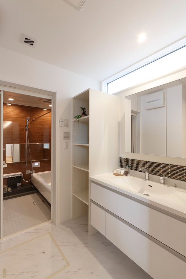 アイムの家熊本（トータルインフォメーション） 【2000～2499万円／広々LDK22帖／スキップフロア／和風モダン】2列型キッチンとウッドデッキが家族を繋ぐ家の建築実例画像9