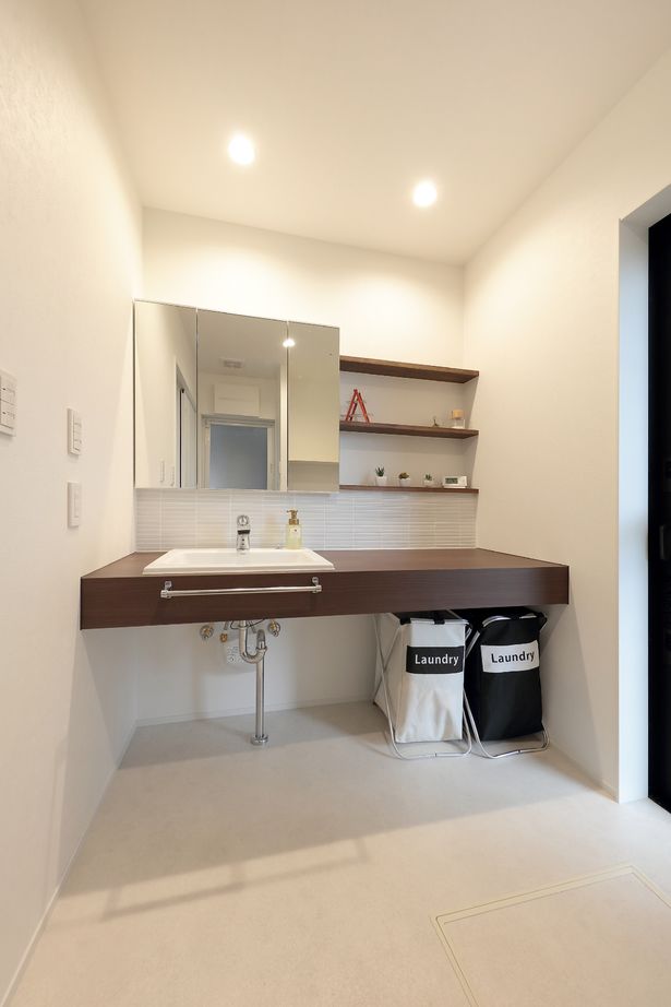 古郡ホーム 【平屋＋α/間取り図あり】意匠にこだわり居心地を重視　２つの中庭がある住まいの建築実例画像4