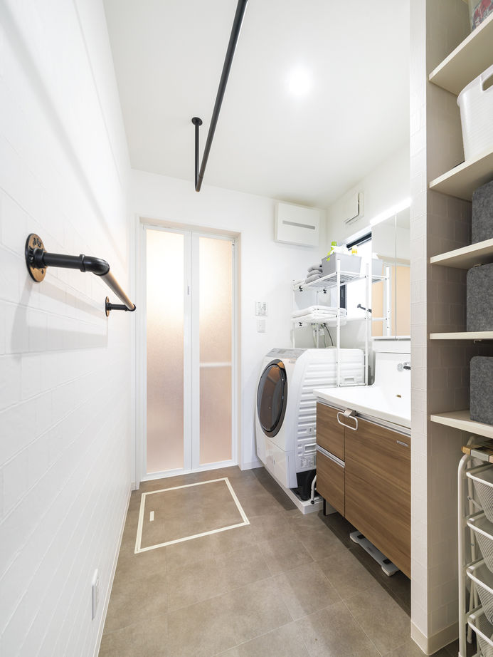 一級建築士事務所　上野工務店 【茨木市・3階建て・1500万円～1999万円】敷地約23坪でも吹き抜けがある開放的な住空間が完成！の建築実例画像7