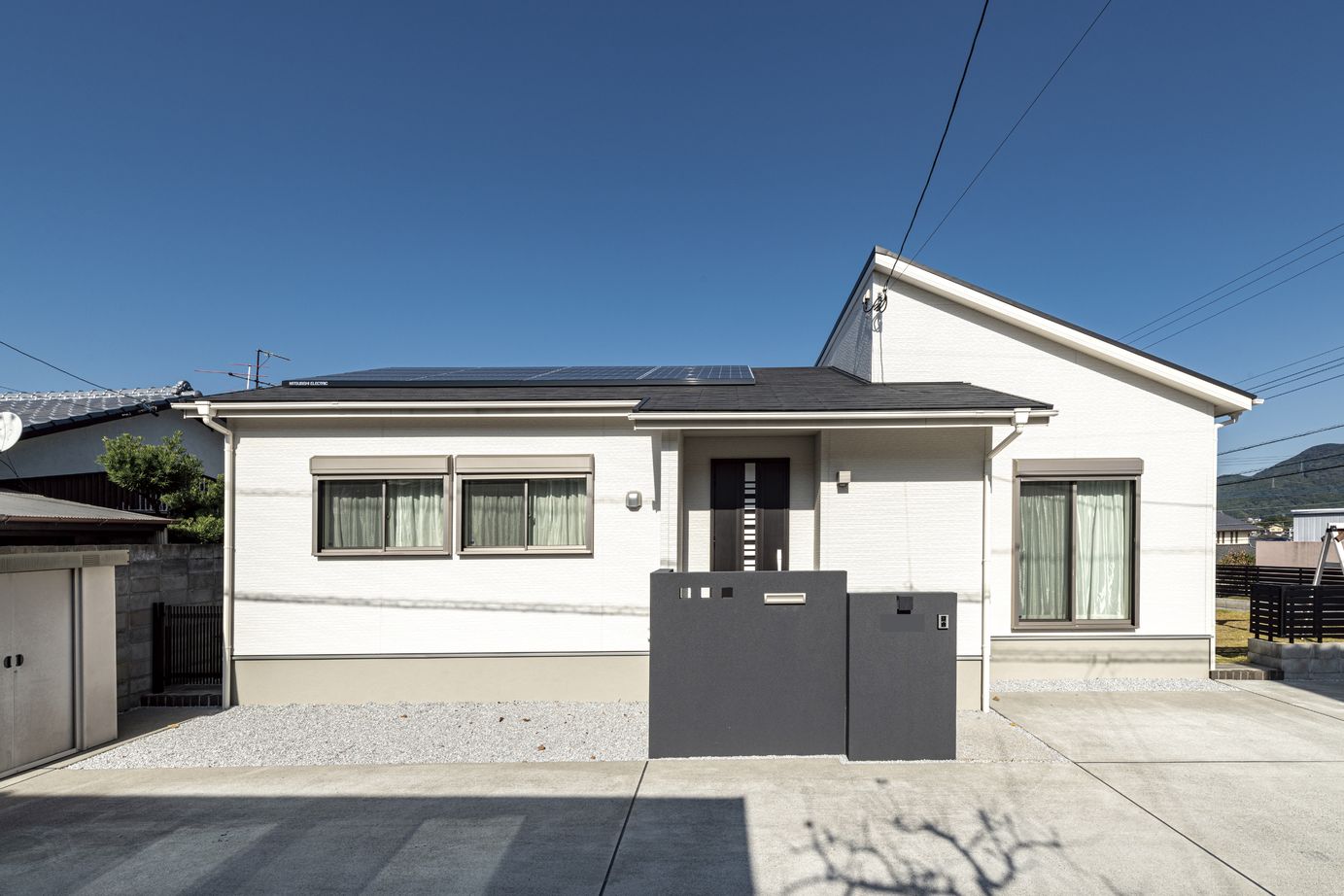 辰巳住宅 【間取り図あり/３LDK＋和室】リビング通る会話あふれる平屋の建築実例画像2