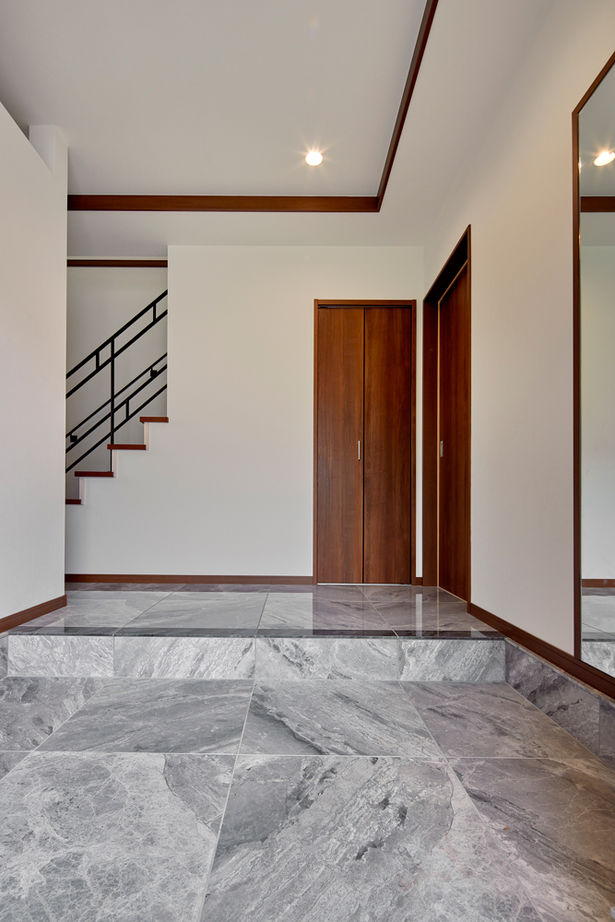 ロイヤルウッド 【95坪×二世帯住宅】凹凸のあるデザインと素材感が際立つ外観、室内の静寂。二世帯が心豊かに暮らせる邸宅の建築実例画像11