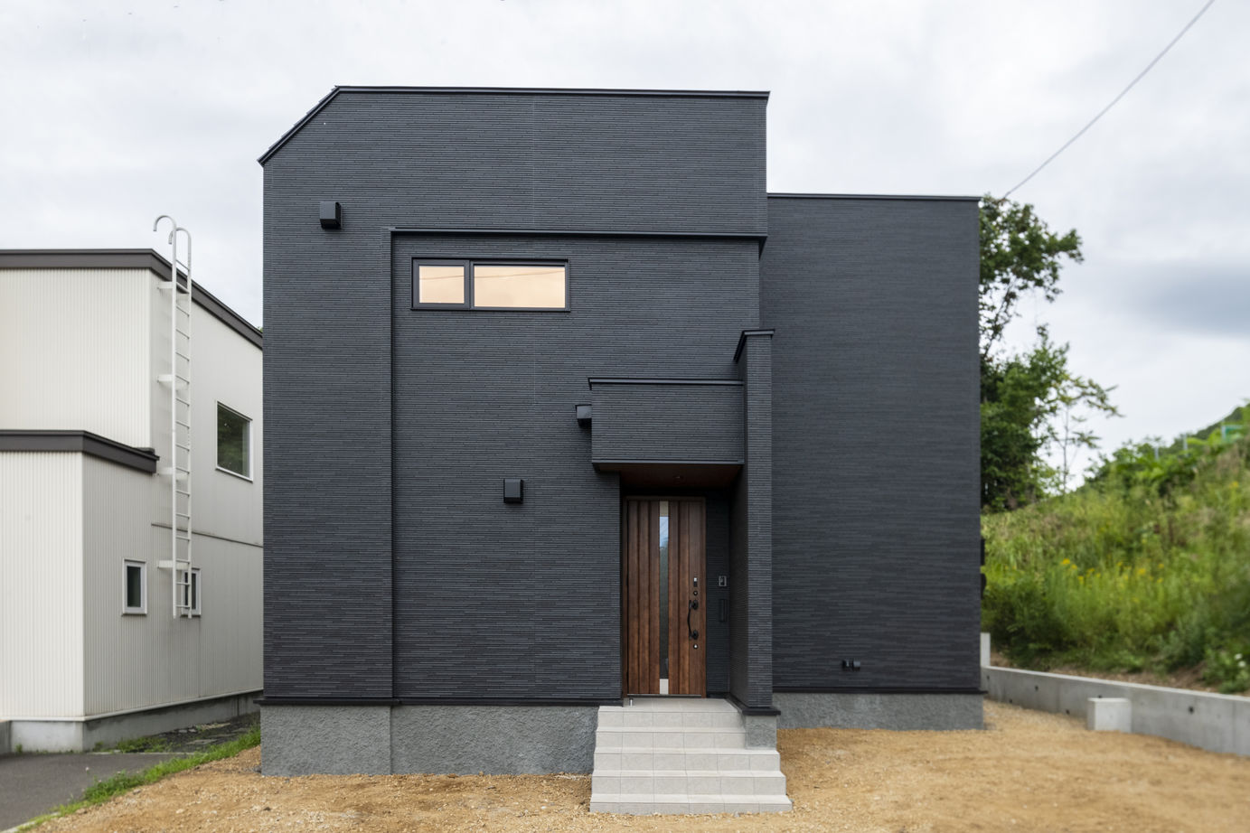 maida koumuten 【札幌市/3000万円台/間取り】お施主様こだわりのスキップフロアと造作階段があるお家の建築実例画像