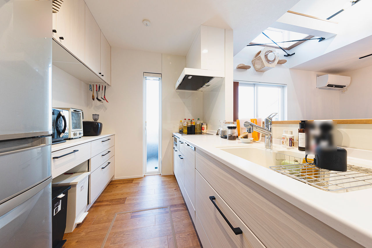 アーキホームライフ 【大阪/1000万円台/吹き抜け】ネコと一緒に快適に暮らす。シンプルな窓なし外観の中に、開放的な家の建築実例画像4