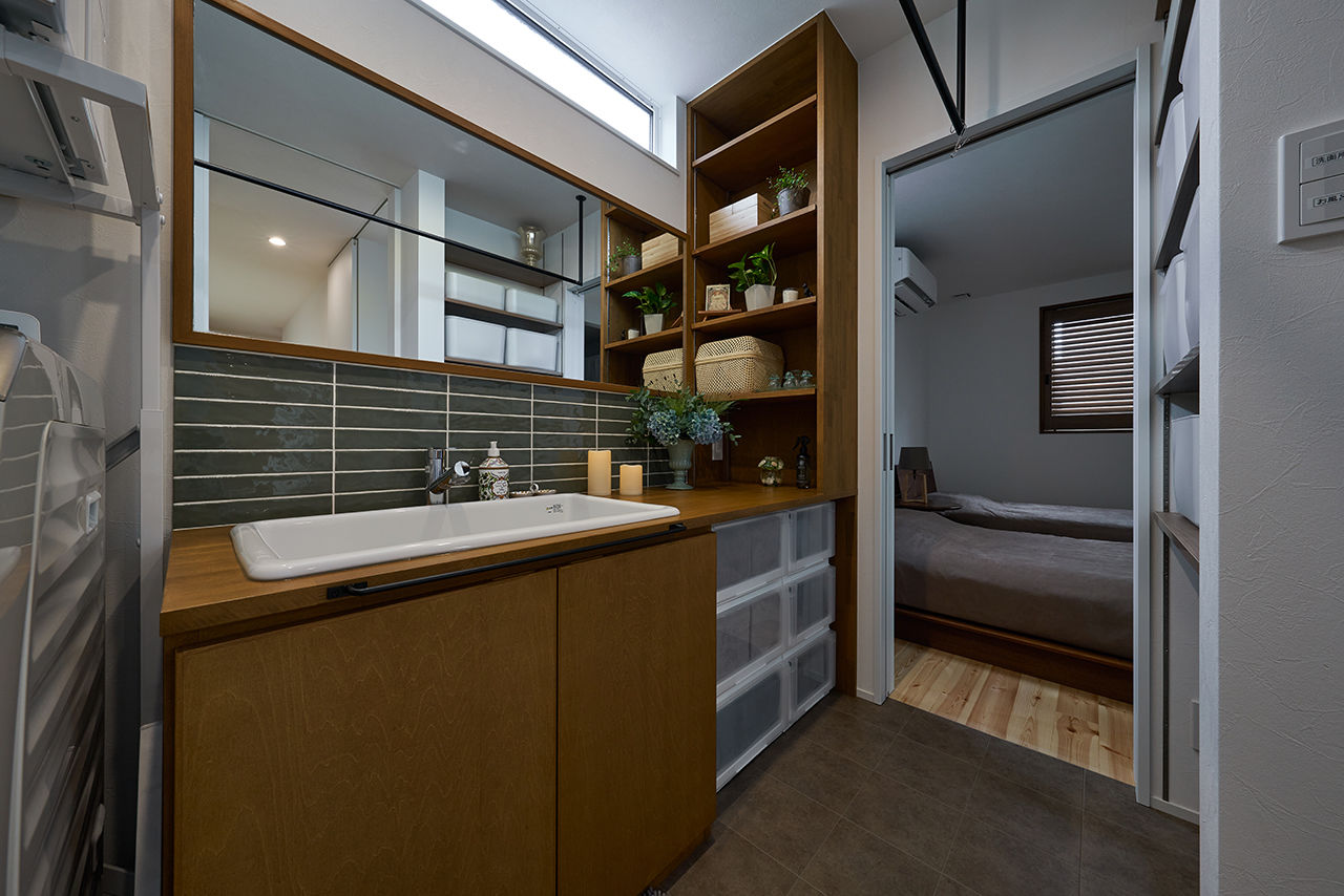 コラボハウス一級建築士事務所 【3000万円台／約31坪／間取り図有】 2つの中庭がある洗練された高級和モダンな平屋の建築実例画像6