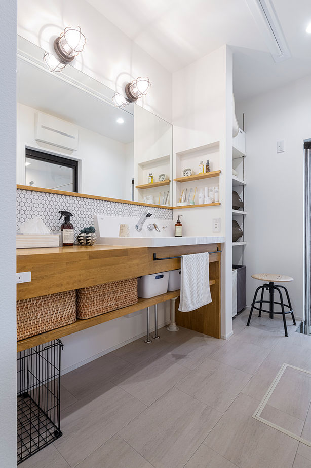 コラボハウス一級建築士事務所 【42坪／鉄骨階段／吹き抜けの大空間】ピットリビングでくつろぐ三角屋根の家の建築実例画像9