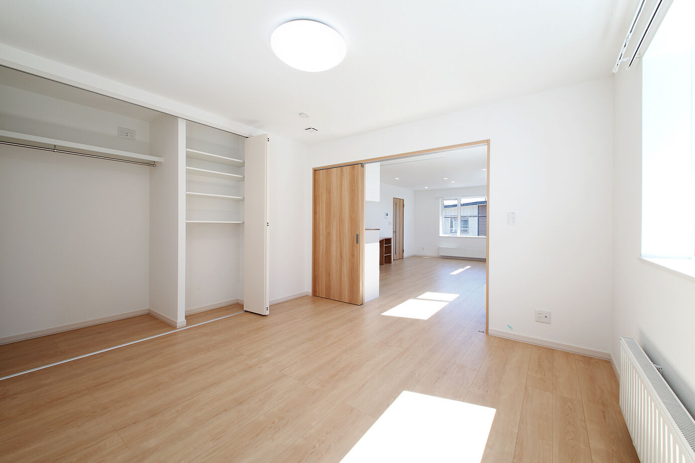 橋本建設 【札幌市／二世帯住宅／3階建て】家族団欒の時間も、プライベートな時間も…設計力で両立させた二世帯住宅の建築実例画像3