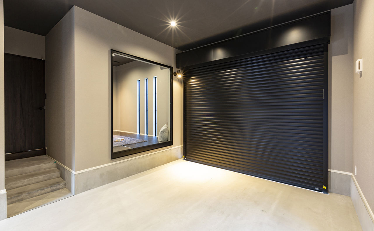 カステルホーム 【平屋／インナーガレージ／2800万円】モノトーンでまとめたスタイリッシュデザインの平屋の住まいの建築実例画像3