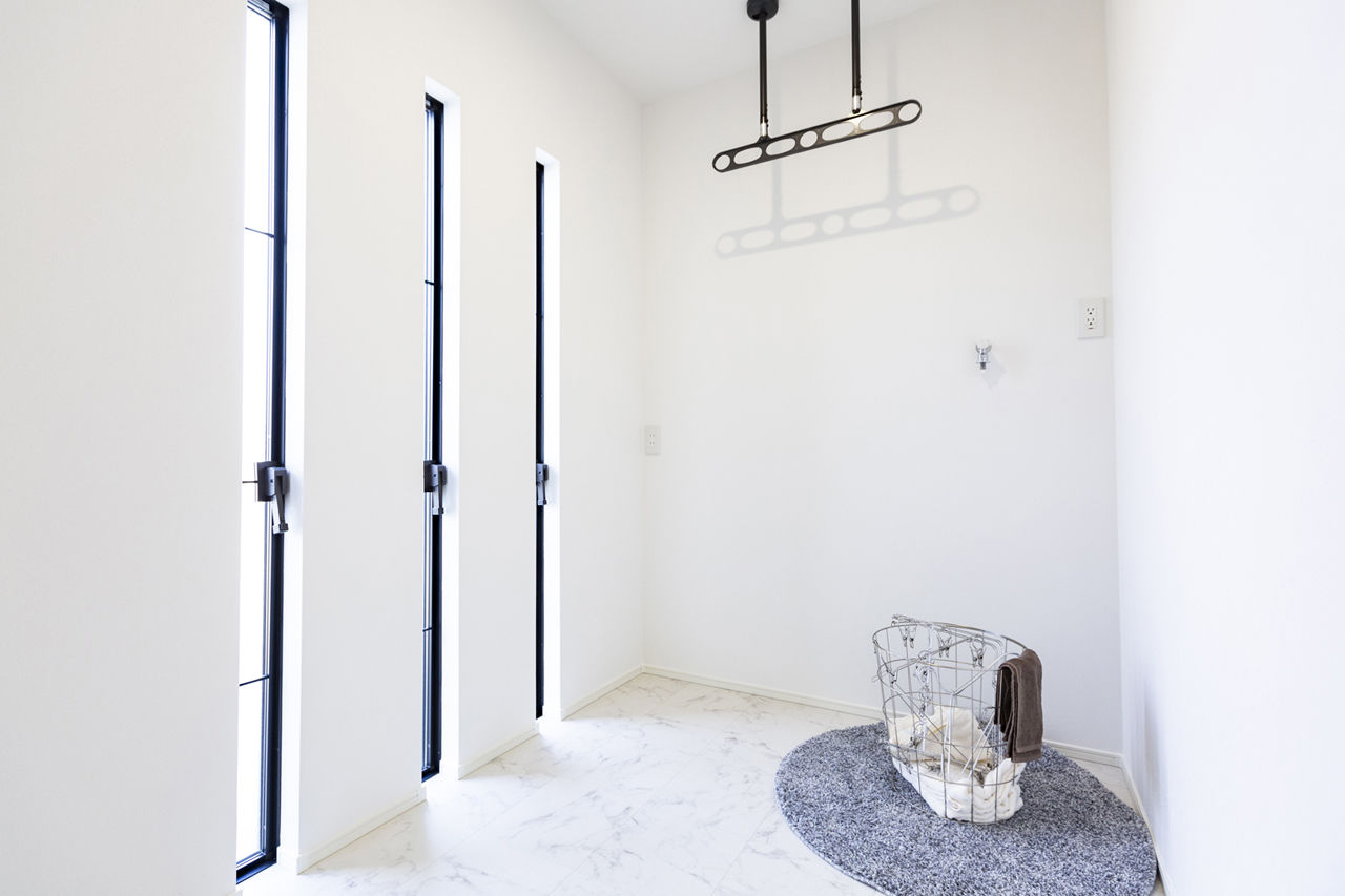 カステルホーム 【平屋／インナーガレージ／2800万円】モノトーンでまとめたスタイリッシュデザインの平屋の住まいの建築実例画像8