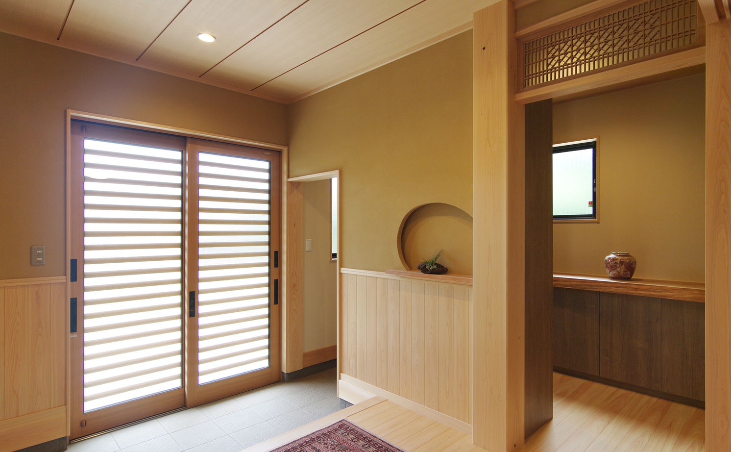 菊池建設 【無垢材/吹き抜け/二世帯住宅】愛着のある旧家の材を活かした本格和室のある和モダンな家の建築実例画像3