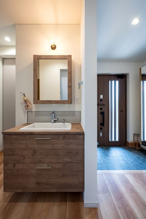 石井工務店 リビング直結のタイルデッキと庭のある高性能住宅の平屋の建築実例画像7