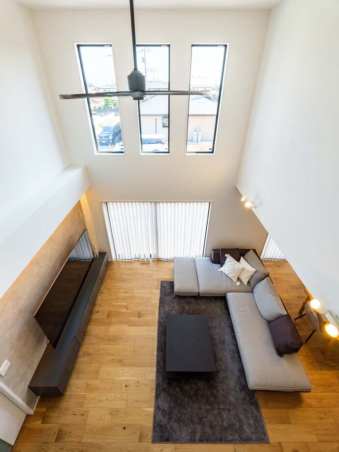 イシンホーム住宅研究会　大縄林業 【間取り有】エアコン効率が良く、冬も夏も快適！家族と猫がくつろぐ吹き抜けのある家の建築実例画像8