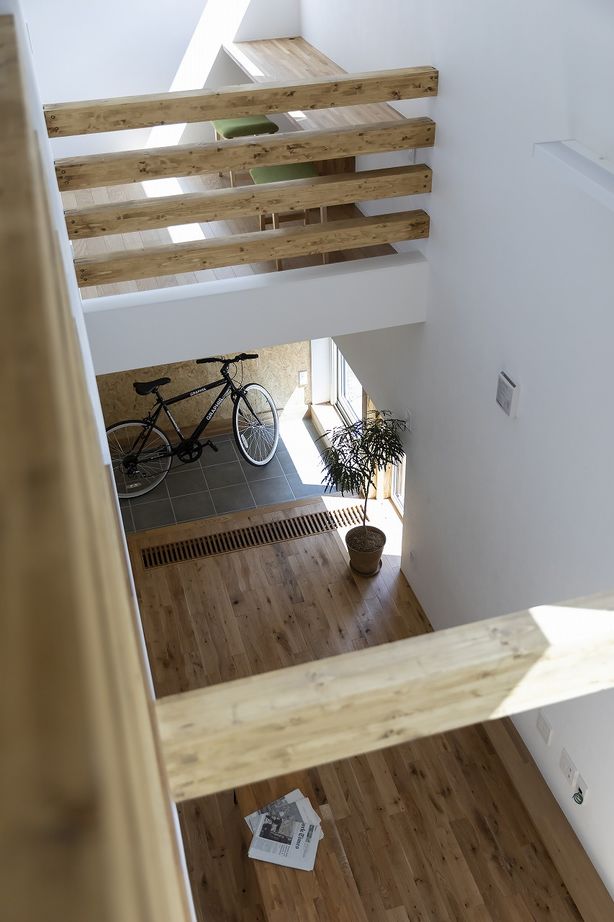 STV興発 【札幌市/３LDK+フリールーム間取図/土間/カウンター/無垢材】東西に長い敷地でも日当たり抜群の住まいの建築実例画像9