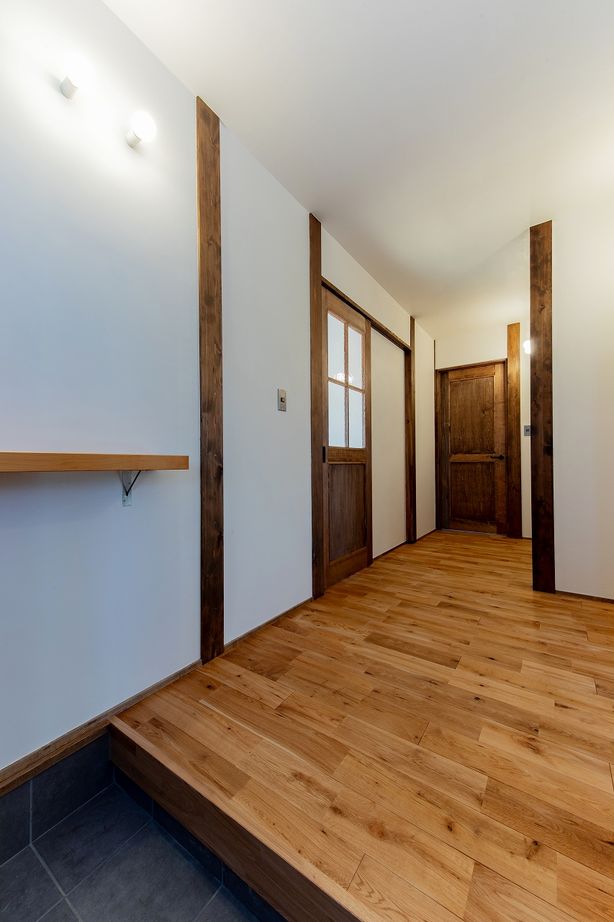 住み家 古材を引き継ぐ漆喰と杉板張りの平屋の建築実例画像4