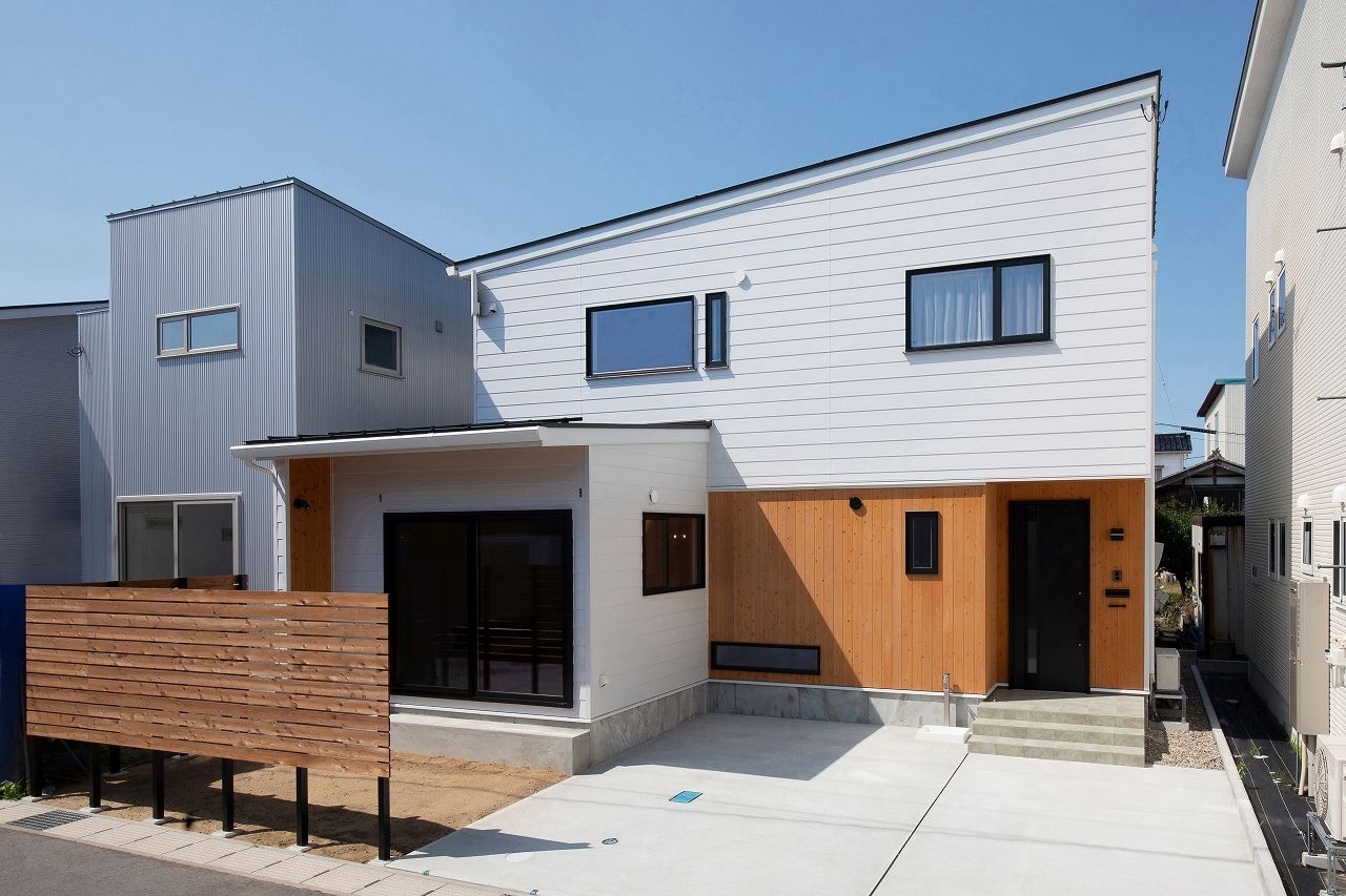 住み家 吹き抜けでつながる家の建築実例画像1