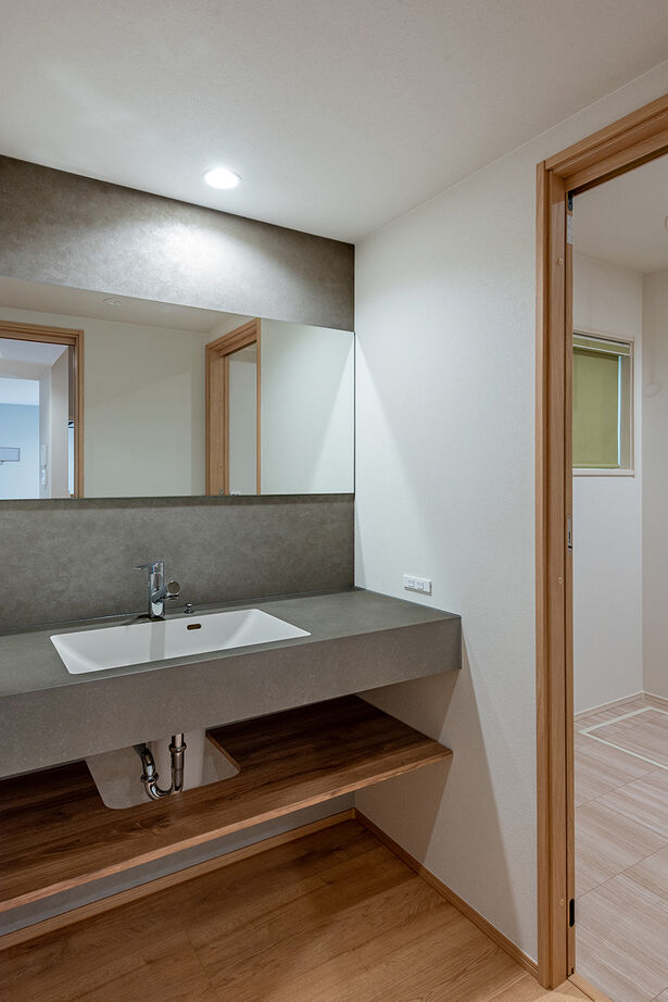 オスカーホーム 2000万円台｜外を通らずに室内へスムーズ！インナーガレージ付。LDKと畳コーナーで家族団欒もゆったりの建築実例画像9