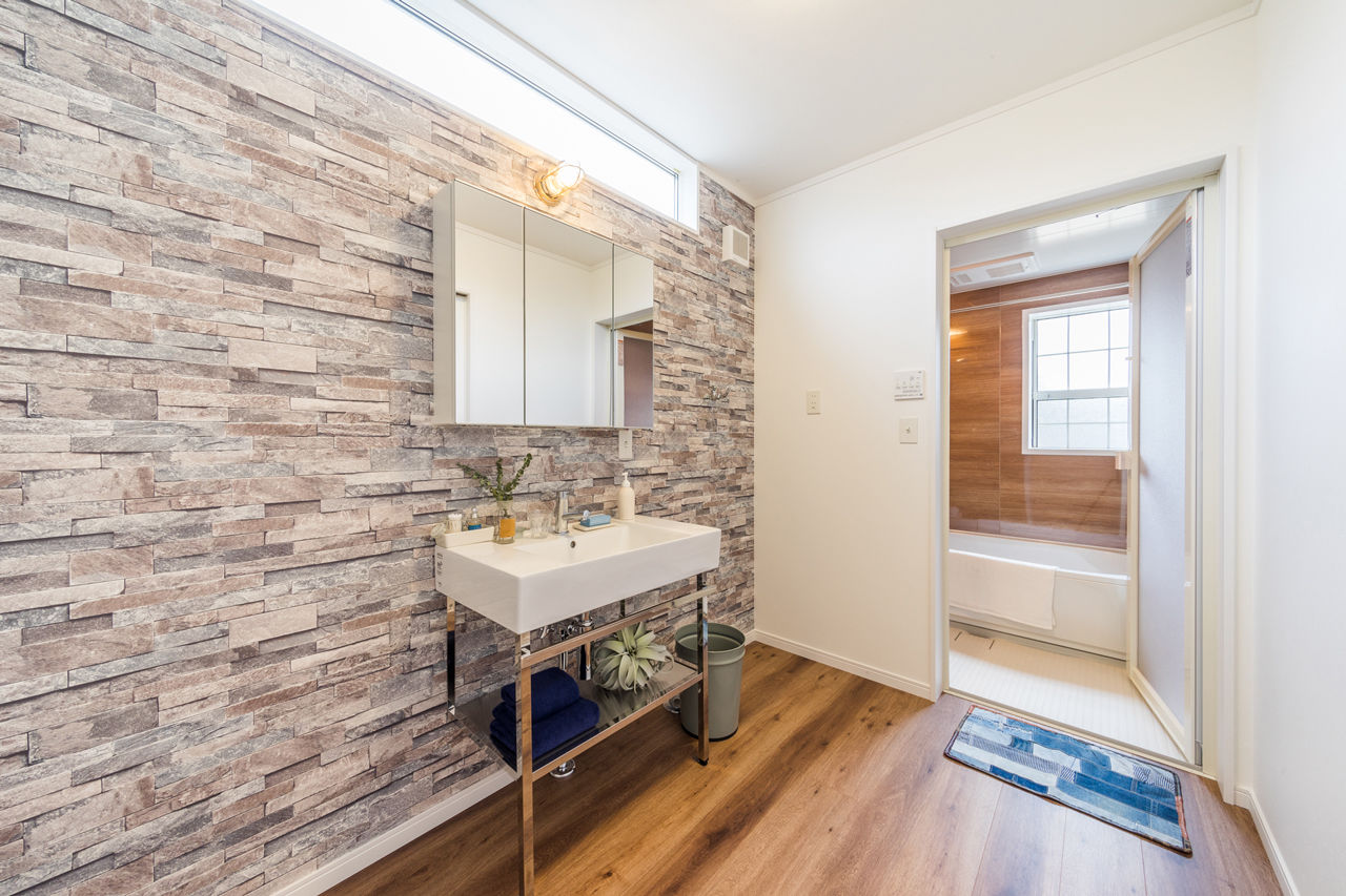 アイキョーホームのガレージハウス 【32.8坪／2300万円/間取り図有】ウッドデッキからあふれる光と風を楽しむカリフォルニアスタイルの住まいの建築実例画像6