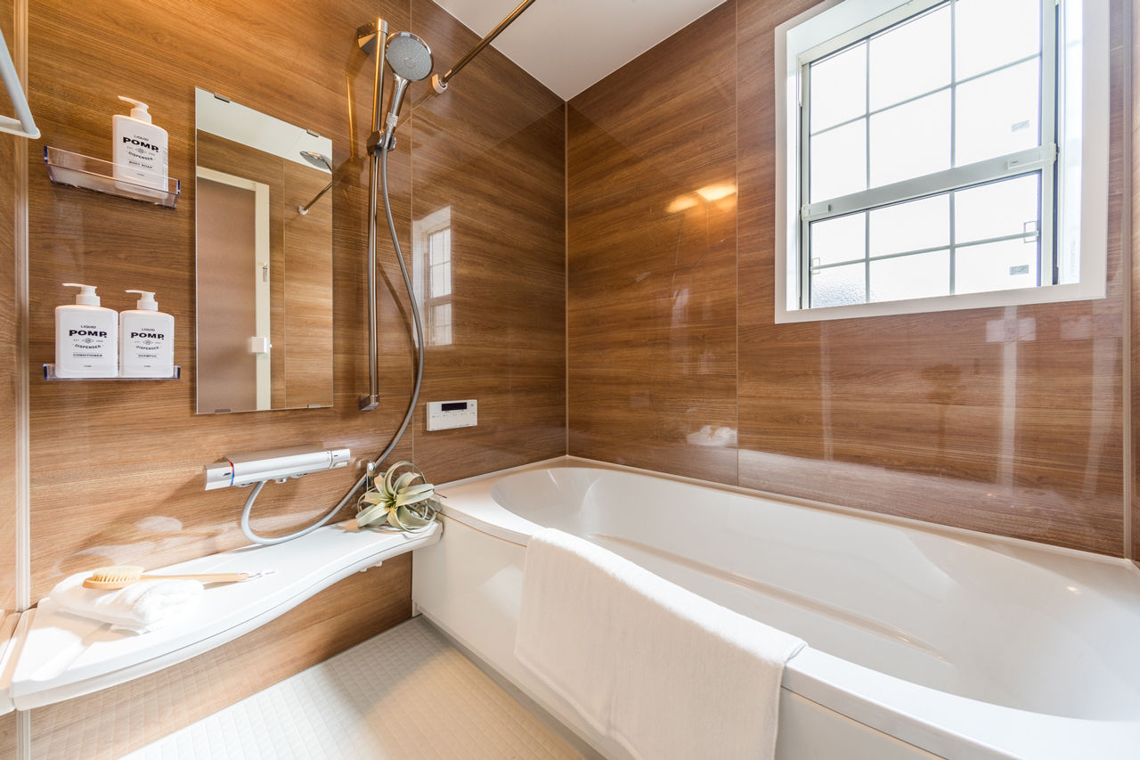 アイキョーホームのガレージハウス 【32.8坪／2300万円/間取り図有】ウッドデッキからあふれる光と風を楽しむカリフォルニアスタイルの住まいの建築実例画像7