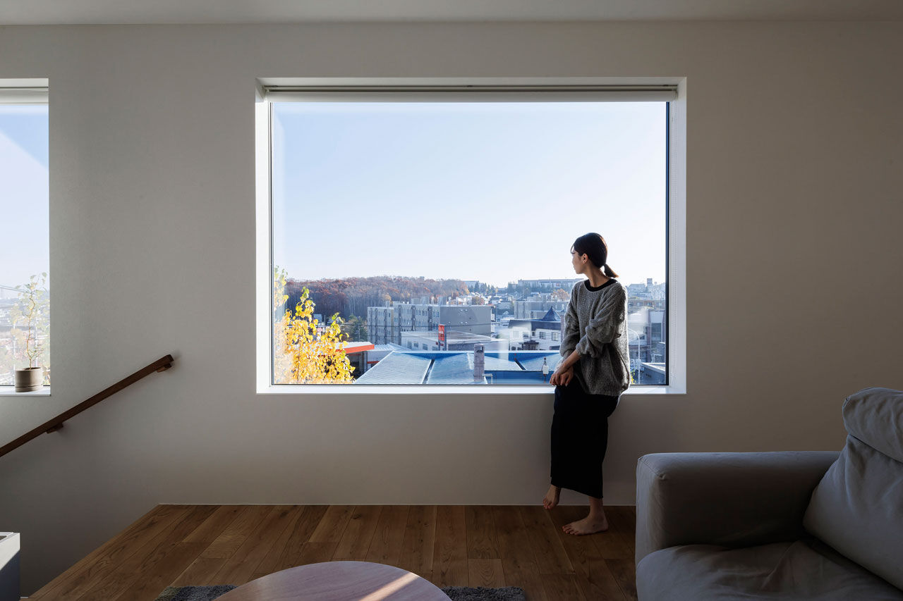 弘信建設 【札幌市/夫婦2人暮らし/間取図有/1LDK+個室2つ＋書斎/風景を取り込む】市街地を一望し静かな時間を楽しむの建築実例画像4