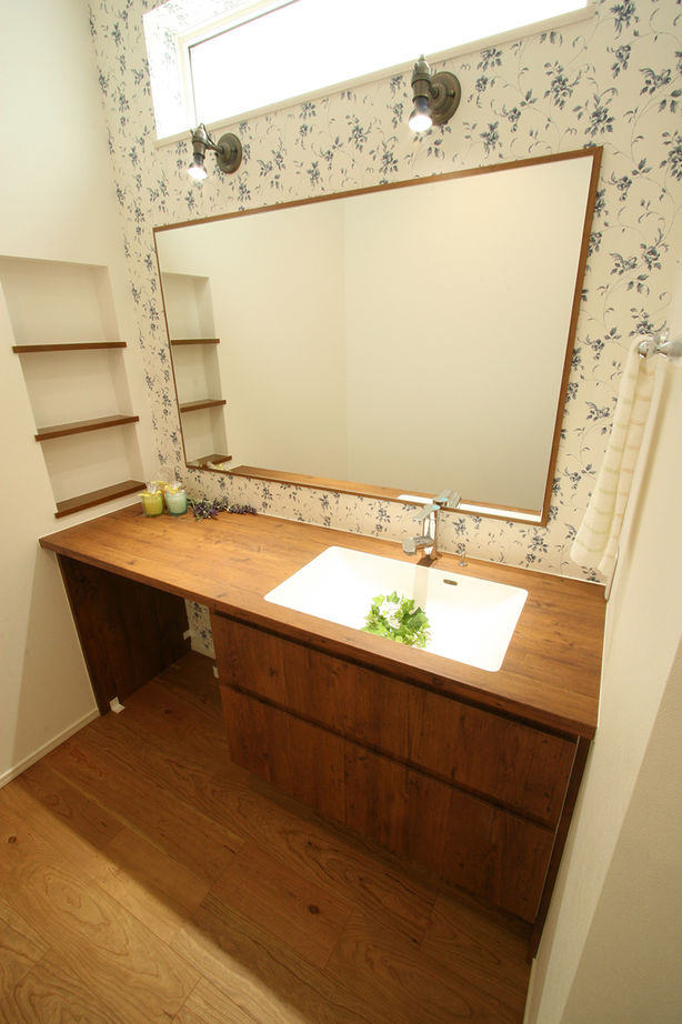 マイホームタナカ 【3LDK】全館空調で快適。ずっとここに居たい、段差をつけて天井高を演出したリビングがお気に入り！の建築実例画像8