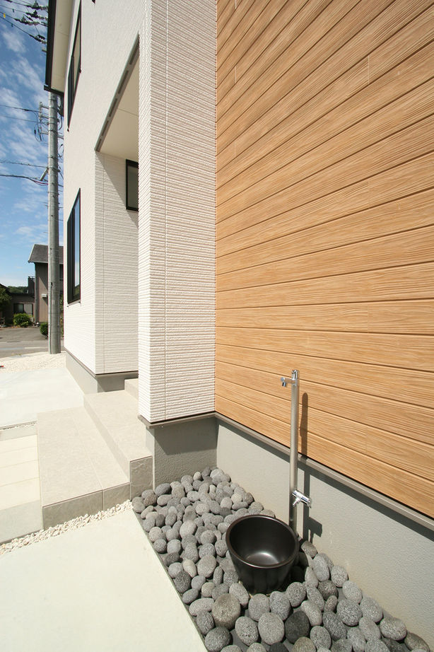 マイホームタナカ 【3LDK】全館空調で快適。ずっとここに居たい、段差をつけて天井高を演出したリビングがお気に入り！の建築実例画像10