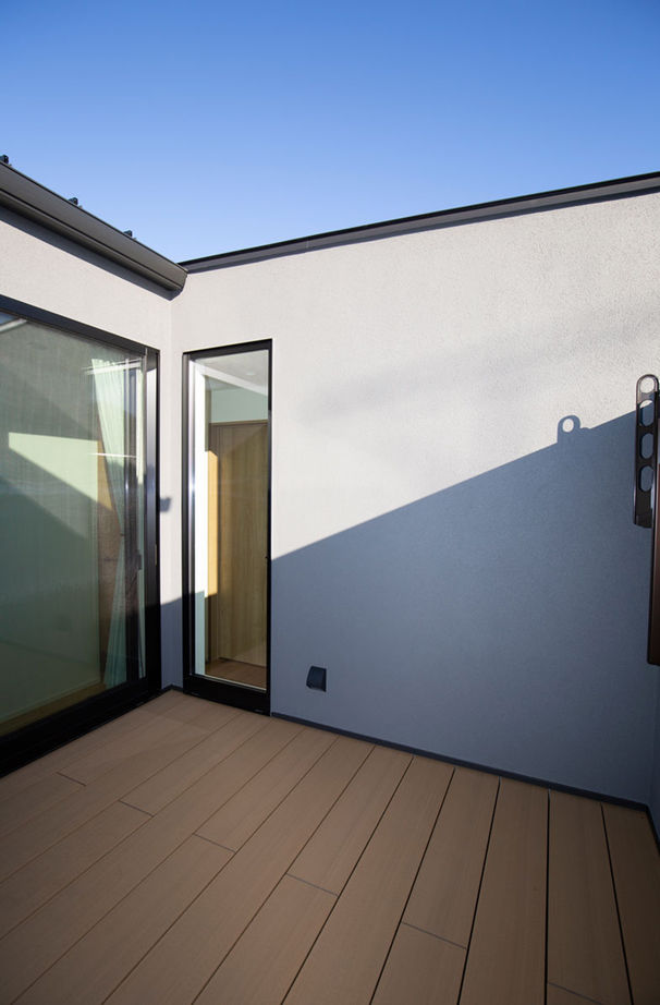 東栄住宅（YUTO-IE） 【延床32.5坪／間取図有】光を採り入れる中庭や2階バルコニーで明るく、心地よく暮らせる家の建築実例画像7