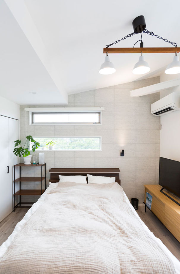 東栄住宅（YUTO-IE） 【延床32.8坪／収納充実／間取図有】開放的な吹き抜けを楽しむ、リゾート風シンプルモダンの住まいの建築実例画像7