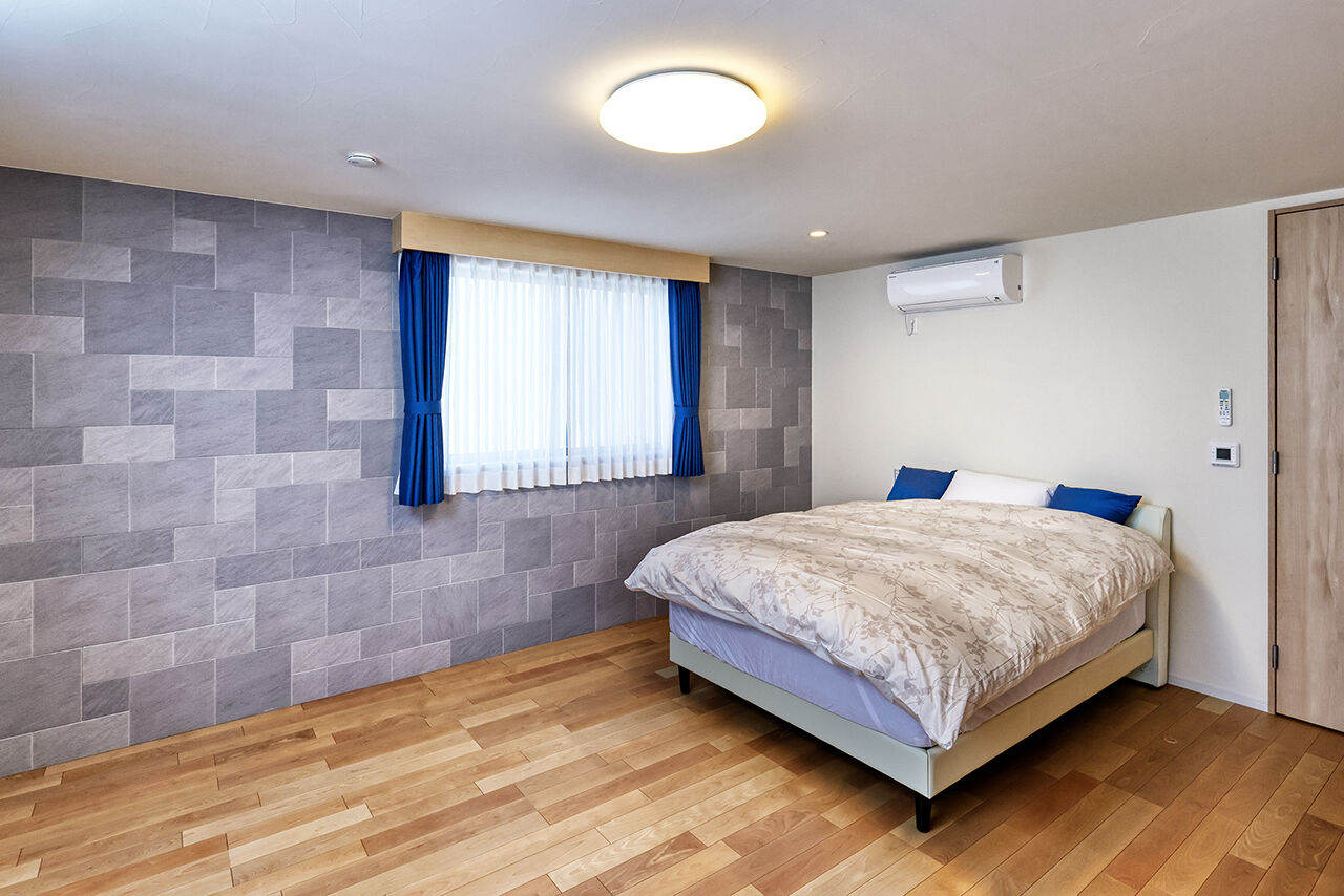 ハウステックス 【9000万円台/60坪台/地下1階・地上2階建て/SE構法】ルーバーの外観が印象的なビルトインガレージのある家の建築実例画像6