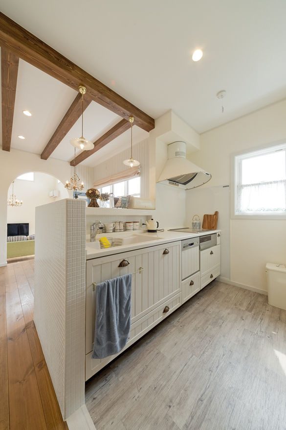 フレンチ工房 【2000万円台/間取り有/33坪】コンセプトはパリのショップ併用住宅。平屋と3階建てを連ねたブルーの家の建築実例画像7