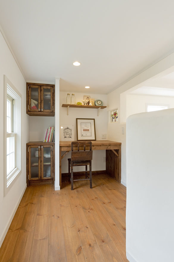 フレンチ工房 【2000万円台/間取り有/33坪】コンセプトはパリのショップ併用住宅。平屋と3階建てを連ねたブルーの家の建築実例画像9