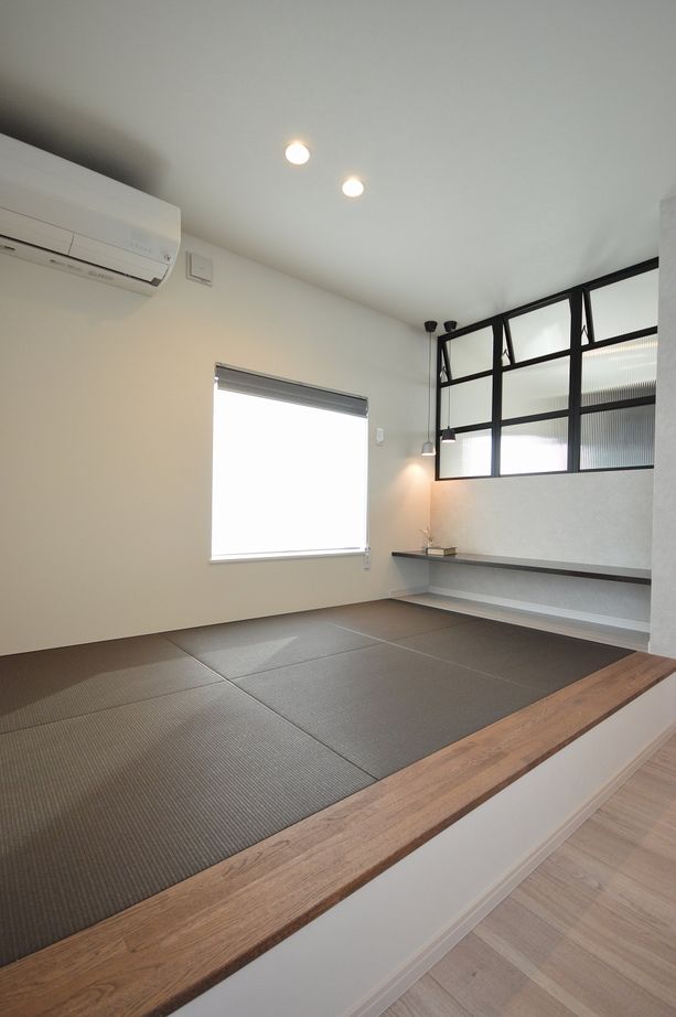 ステーツ 枠の見えない特殊な大開口窓がウッドデッキと外をつなげるお住まいの建築実例画像3