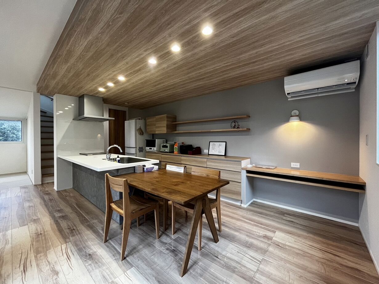 ステーツ キッチンが主役、回れる動線の家の建築実例画像1