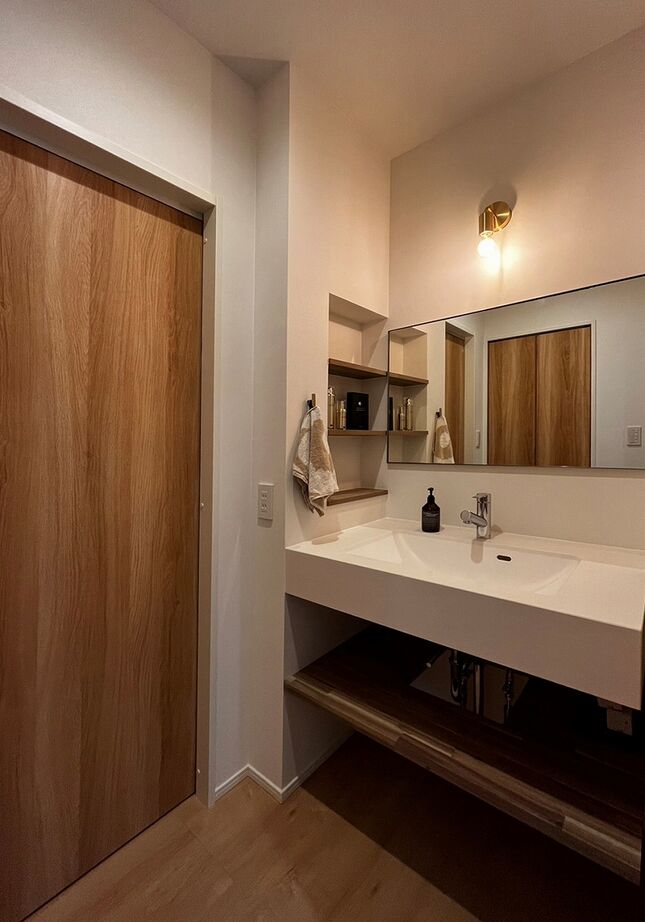 ステーツ キッチンが主役、回れる動線の家の建築実例画像9