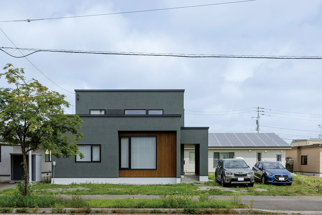 北王 【光が巡る明るい家】美しいアイランドキッチンが、空間をシックに飾るの建築実例画像1