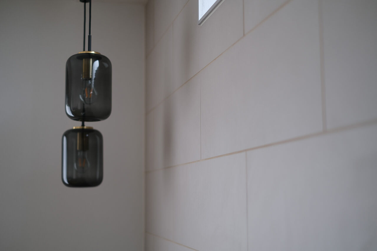 北王 【光が巡る明るい家】美しいアイランドキッチンが、空間をシックに飾るの建築実例画像5