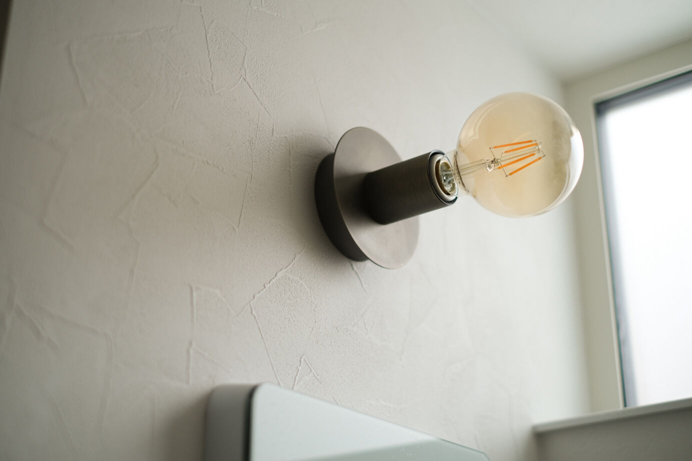 北王 【床座リビングと土間の家】吹抜けの土間とスキップフロアでつながるリビング。床座でくつろぐ上質な暮らしの建築実例画像12