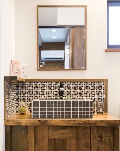 TDホーム静岡西　ウエストンホームズ 【静岡市/1000万円台/30坪以下/2階建て/L字ファサード】木の香引き立つ造作家具の家の建築実例画像2