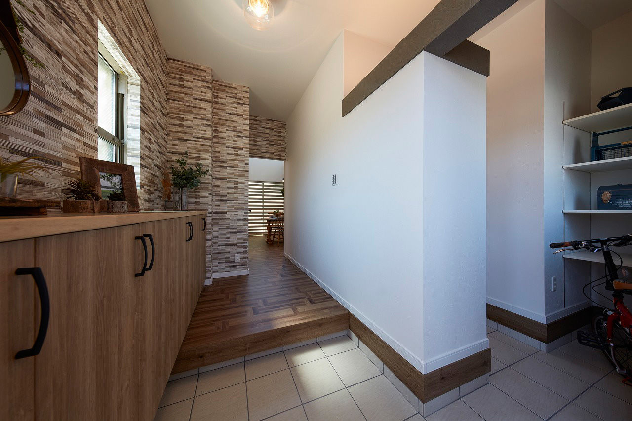 高橋開発の注文住宅 【大阪/2100万円台/2階建て/吹抜け/30坪/間取り図有】畳コーナーとLDKで20畳の自然光をたっぷり感じるお家の建築実例画像9