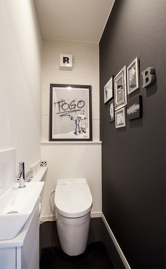 木下工務店 大きな吹き抜けのアトリエがある、モダンでクールな都心の二世帯・3階建ての建築実例画像7