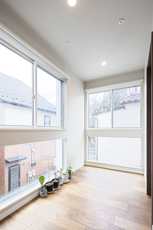 木下工務店 【吹抜／屋上／サンルーム／旗竿地／間取図有】ホテルを想わせる明るい大空間。開放感が生む家族のつながりの建築実例画像9