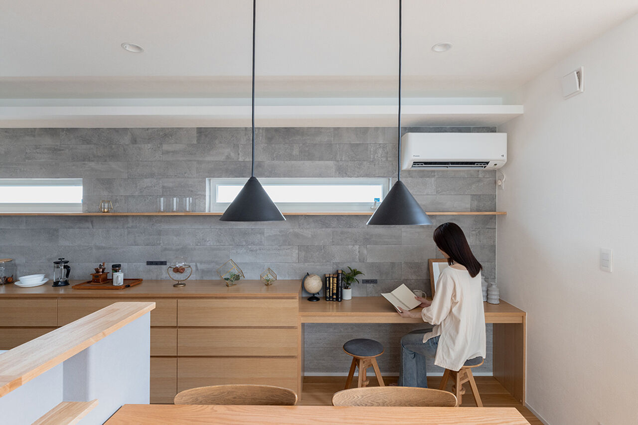 山下ホーム 【富山市/37.1坪】グレーと木が調和する、開放感と心地よさのある住まいの建築実例画像6