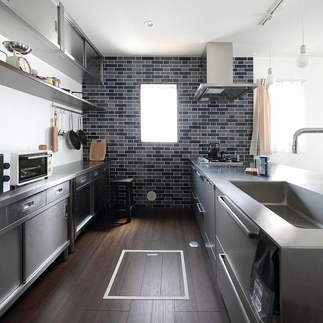 アルルホームズ 【1500～2000万円】格好良いこだわりキッチンを軸に、素材の魅力が引き立つ家の建築実例画像4