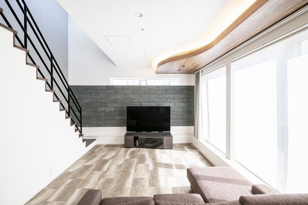 アーキテックプランニング 【2000～2499万円/間取図有/4LDK】曲線と直線が美しい。スキップフロア等随所にこだわりを詰め込んだ住まいの建築実例画像1