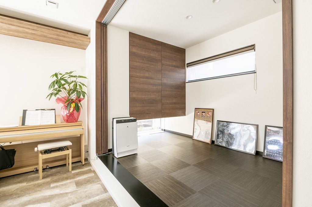 アーキテックプランニング 【2000～2499万円/間取図有/4LDK】曲線と直線が美しい。スキップフロア等随所にこだわりを詰め込んだ住まいの建築実例画像3