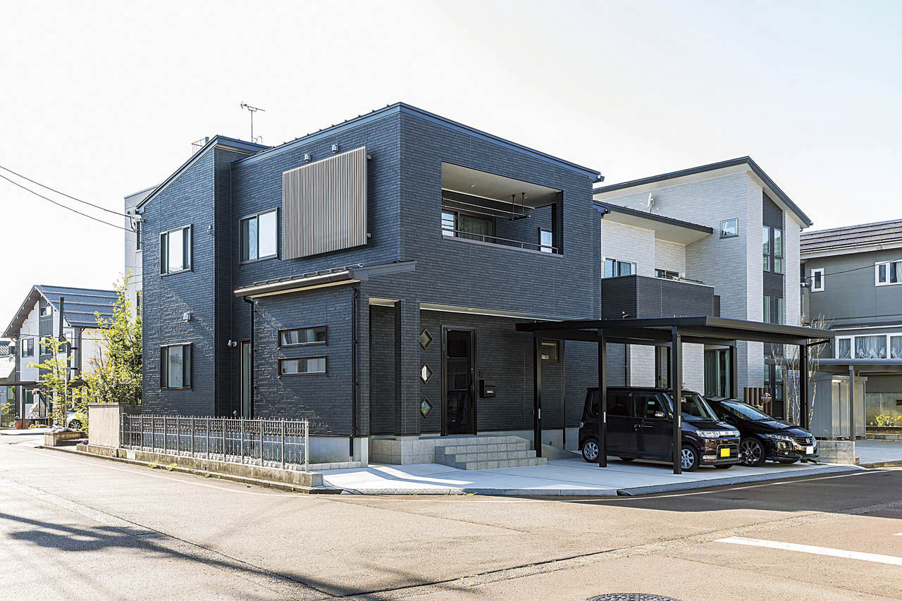 イシカワ 【2階建て／ダウンフロアリビング】モノトーン×ビビッドカラーの個性あふれるインテリア空間の建築実例画像4