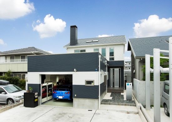 住友不動産ハウジング 【ビルトインガレージ／吹き抜け／約40坪】ソファに座って車と薪ストーブを眺める夢を叶えた家の建築実例画像1