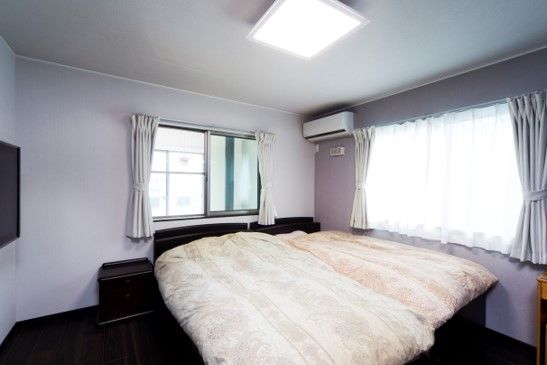 住友不動産ハウジング 【ビルトインガレージ／吹き抜け／約40坪】ソファに座って車と薪ストーブを眺める夢を叶えた家の建築実例画像5