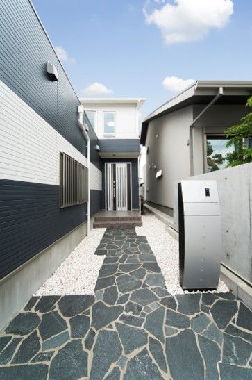 住友不動産ハウジング 【ビルトインガレージ／吹き抜け／約40坪】ソファに座って車と薪ストーブを眺める夢を叶えた家の建築実例画像6