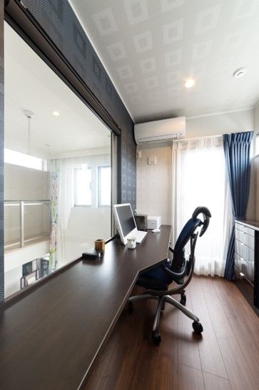 住友不動産ハウジング 【3階建て／ビルトインガレージ／約89坪】吹き抜けの開放感が心地よい、季節を楽しむ二世帯住宅の建築実例画像4