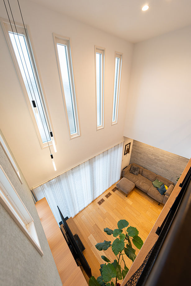 セキスイハイム 【38.8坪/夫婦＋子ども1人】大きな吹き抜けのある開放空間で広々と暮らす、家族もペットも心地よい住まいの建築実例画像4