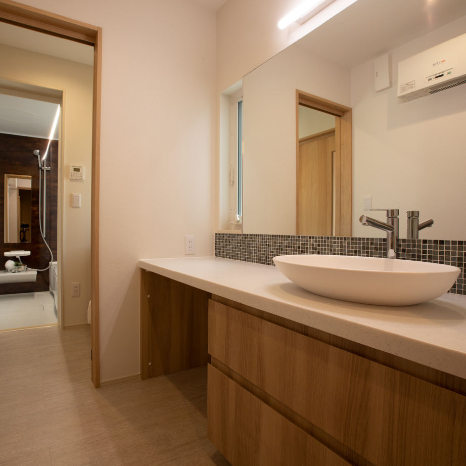 ニューハウス工業 木のぬくもりに包まれた大きな吹抜のある住まいの建築実例画像5